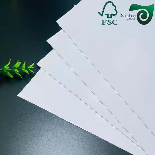 Close-up view of FSC certified gloss coated paper texture and quality