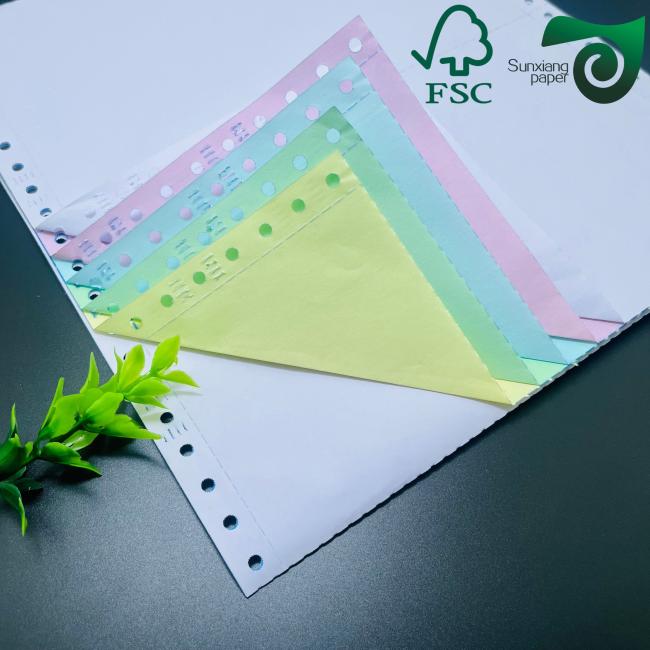 Carbonless copy paper sample showing multiple colored sheets