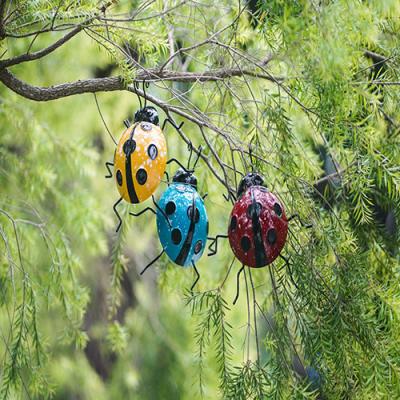 中国 Unique Metal Yard Ornaments Medium Metal Garden Ladybugs Tree Decor 販売のため