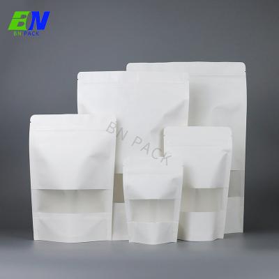 China Plain Stand Up Resealable Food Grade White Kraft Paper Bags With Window For Snack for sale