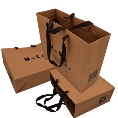 China Craft Paper Brown Custom Paper Shopping Bags With Ribbon Merchandise for sale