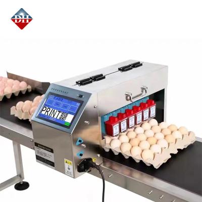 China Six Nozzle Automatic Egg Spray Coding Machine Printing for sale