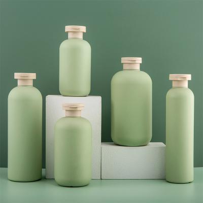 China 250ml 300ml 500ml HDPE Light Green Flip Top Lotion Shampoo Body Wash Bottle for sale