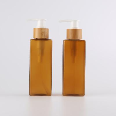 China Organic Bamboo Cosmetic Packaging Plastic Pump Bottles With Bamboo Tray 4oz 120ml Square for sale