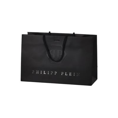 China Black Custom Printed Kraft Shopping Bags With UV Coating Silver Stamping for sale
