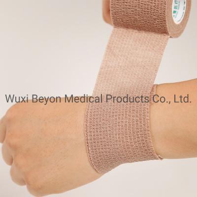 China Red Non Woven Cohesive Bandage Medical Compression Self-Adhering Flexible Protect Body Parts for sale