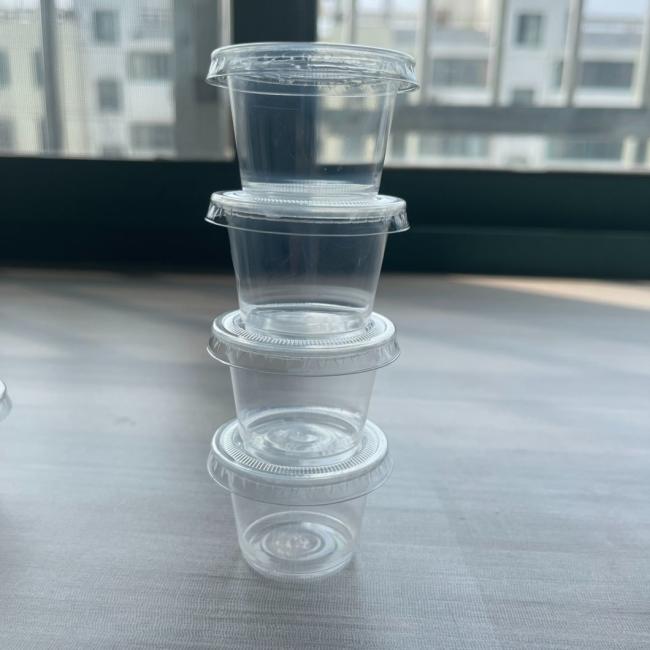 China Supplier Disposable Small Plastic Sauce Cup 2 Oz Pudding Portion Condiment Cups with Lids Jello Shot Cups