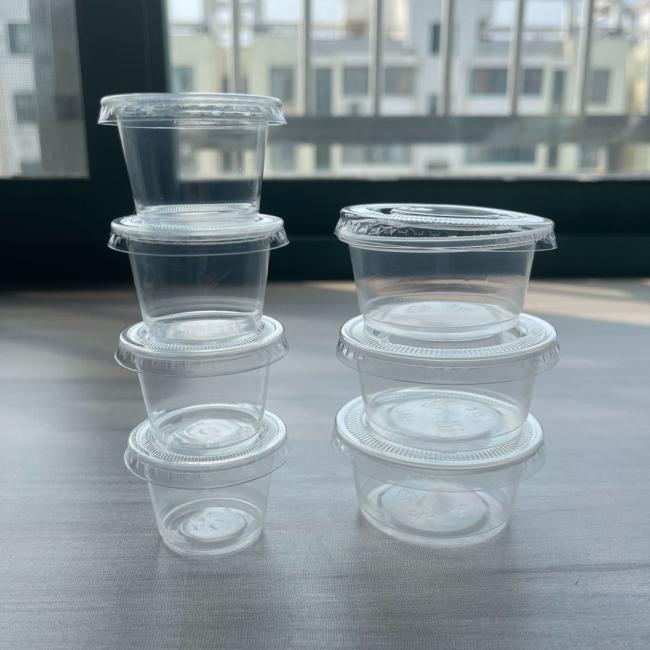 China Supplier Disposable Small Plastic Sauce Cup 2 Oz Pudding Portion Condiment Cups with Lids Jello Shot Cups