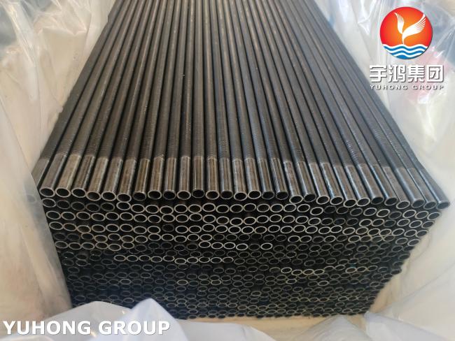 Manufacturing sample of carbon steel low fin tube showing extruded aluminum fins