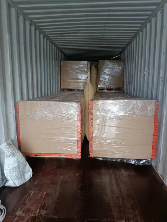 Heavy duty pallet racking system loaded with warehouse goods