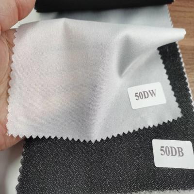 China Garment Fusing Interlinings Linings GAOXIN Fusible Woven Polyester 40gsm /-2g Custom Width for sale