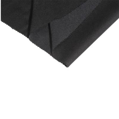 China 45G Polyester Tricot Fabric Plain Weave Dot Fusing Woven Fusible Interlining for sale