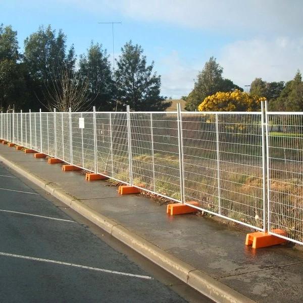 Close-up view of temporary fence panel construction and mesh detail