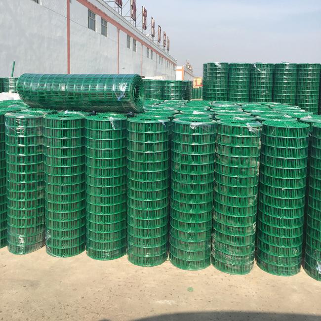 Close-up view of welded wire fence mesh showing wire thickness and spacing