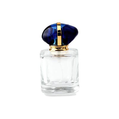 China Creative Perfumer Glass Bottle With Blue Stone Cap for sale