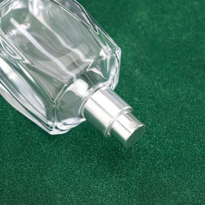 China Transparent 50ml Perfume Empty Bottle Square Cut Rhombic 15 Bayonet Cosmetic Fine Spray Glass Bottle for sale