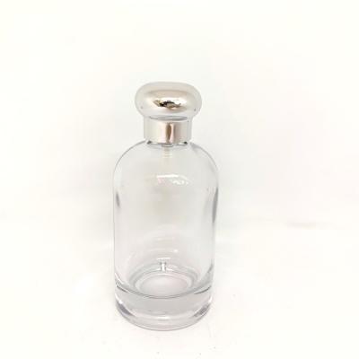 Chine la bouteille de parfum 100ml avec le chapeau en plastique de zamac, bouteille en verre, pulvérisent la baïonnette, bouteille vide, emballage de parfum à vendre