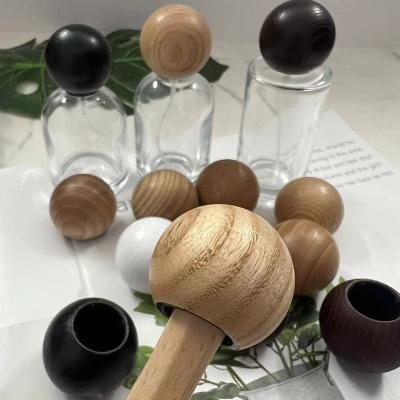 China Natural Solid Wood Ball type Perfume Bottle Cap for sale