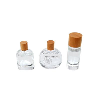 China Natural Solid Wood Cylinder Type Perfume Bottle Cap With bottle for sale