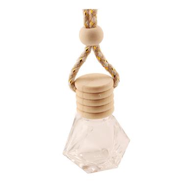 China 8ML Diamond Perfume Bottle, colgante de la botella de perfume del coche, vidrio transparente, botella vacía con el casquillo de madera en venta