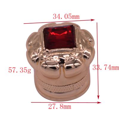 China Decorative Diamond Fashion Zamak Perfume Caps Custom Perfume Bottle Caps for sale