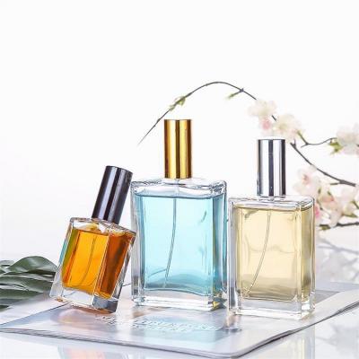China 10ml 15ml Flat Square Perfume Oil Spray Bottle Luxury Glass Material for sale