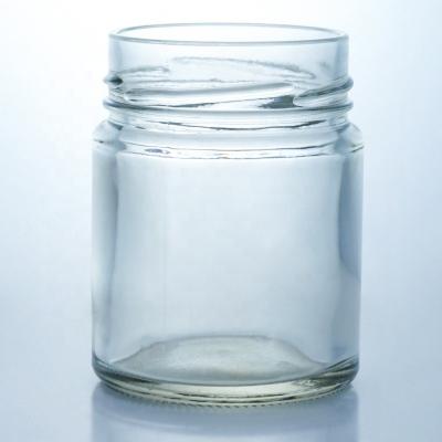China Customized 500ml Wide Mouth Round Glass Honey Jar with Metal Cap and Glass Base Material for sale