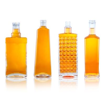 China Botella de vidrio de licor extra para marcas Whisky Gin Rum Champagne y Brandy en venta