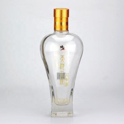 China Tipo de sellado de vidrio CROWN CAP 500 ml 750 ml Botella de licor de ginseng de licor medicado en venta
