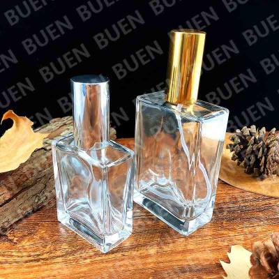 China Empty Perfume Glass Bottles Clear 100ml 58mm Long Square Custom LOGO for sale