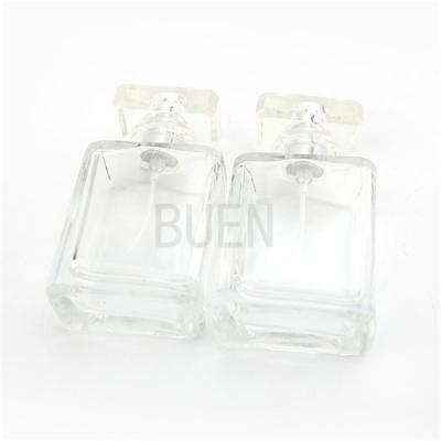 China 50ml Square Transparent Perfume Bottle With Multicolor Cap à venda