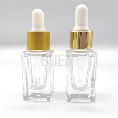 China Empty Glass Clear Serum Bottles Square With Wood Grain Dropper Cap for sale