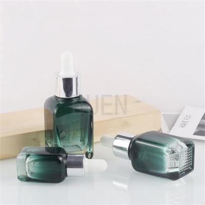 China Gradual Green Glass Mini Dropper Bottles Square Non Toxic Buen 1oz for sale