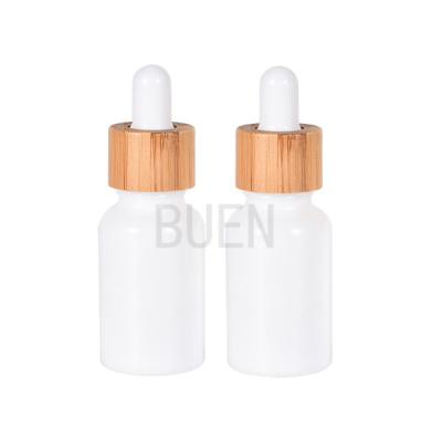 China Bamboo Collar Glass Cosmetic Dropper Bottle White Porcelain Glossy for sale