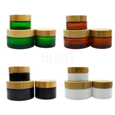 China Frosted black Cosmetic Cream Containers face moisturizer With Bamboos Screw Lid Engraving for sale