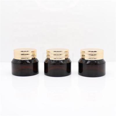 China Eco Friendly Eye Cream Glass Cosmetic Jars Packaging With Light Gold Lid for sale