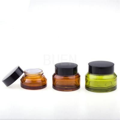 China Light Green Glass Cosmetic Jars Oblique Shoulder Cream Glass Jars 200g for sale