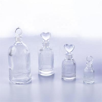 China Reed Glass Aroma Bottle Plug Lid Cylinder Diffuser Oil Containers for sale