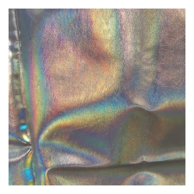 China Highly elastic leather rainbow holographic metallic film transfer with glue stamping foil for man shoes surface genuine leather deco for sale