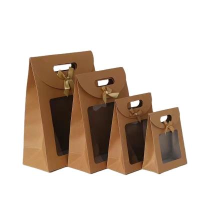 China Bolsa de papel de comida pequeña de fondo plano reciclado al por mayor bolsa de cartón de compras bolsa de embalaje bolsa de papel kraft marrón con ventana transparente en venta