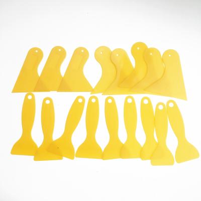 China Environmentally Friendly Materials Plastic Putty Knife Hand Plastic Scraper Wall Putty Knife for sale