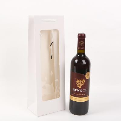 China Glossy Luxury Design kraft paper wine gift bags For Mother'S Day for sale