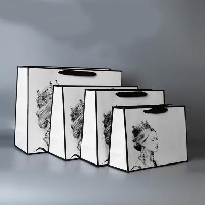 Chine Logo Shopping Paper Gift Bags fait sur commande avec des poignées Logo Print à vendre