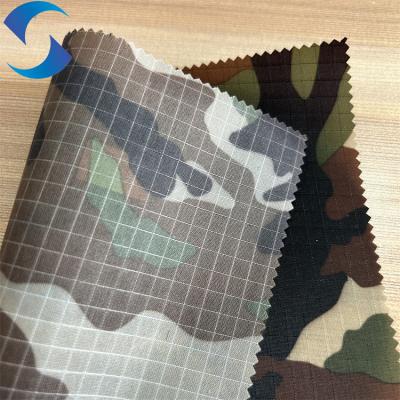 China Smooth And Breathable 63GSM Lining Fabric 0.5M Ripstop Camouflage With PU Coating en venta