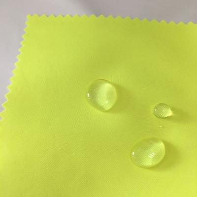 China Polyester Fluorescent Reflective Water Risistance PU Membrane Rain Suits Fabric for sale