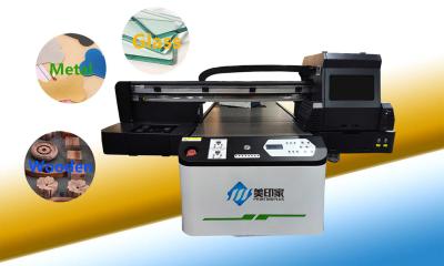 China High Performance 6090 UV Flatbed Printer With Printable Area Up To 600x900MM à venda