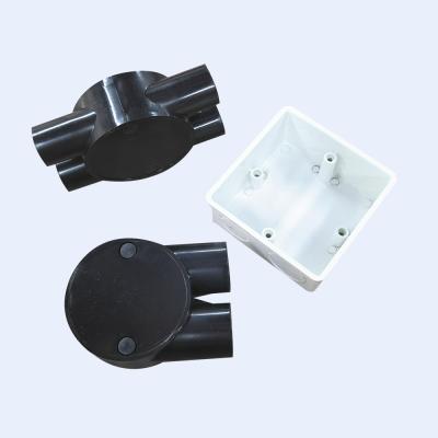 China UPVC Junction Box One Way To Four Way 20mm 50mm Black White Low Smoke Material for sale