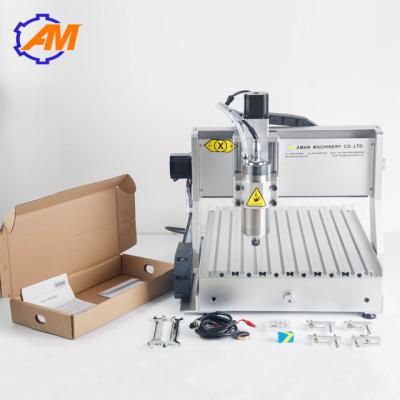 China Hot sell metal mini 3d cnc engraving machine AMAN3040 3 axis wood carving milling cutting machine DIY router for sale for sale