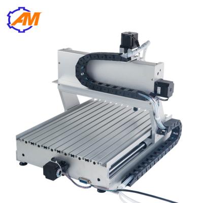 China Low price cnc hard wood router ball screw 4axis 3040 spindle motor mach3 cnc router engraving machine for sale