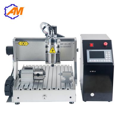 China AMAN 3040 mini cnc router metal woodworking cnc engraving machine 3040 cnc engraving wooden plates craft supplies for sale